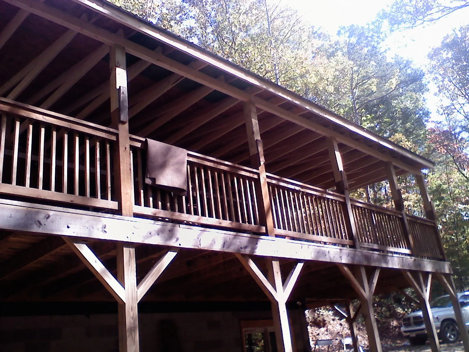 Timber framing under a new elevated porch and deck — Roof Leak Repair in Harwood Heights by Roofing Brothers